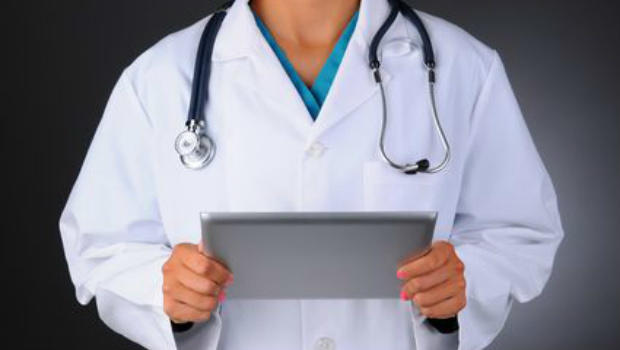 Doctor holding tablet computer