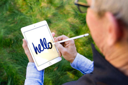 Apple CEO Tim Cook with the 2019 iPad mini