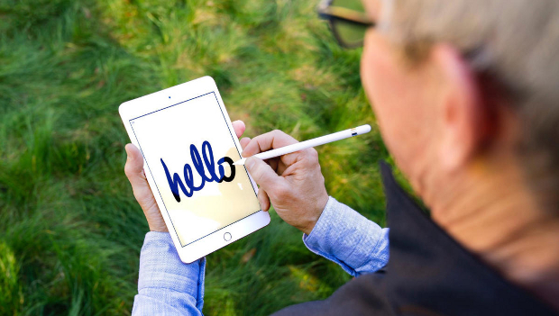 Apple CEO Tim Cook with the 2019 iPad mini