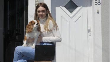 Girl with Laptop and dog
