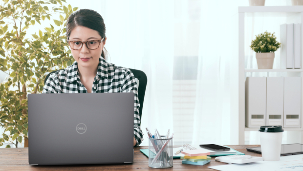 Asian female office worker with mobile laptop computer at home - WFH, APJC.