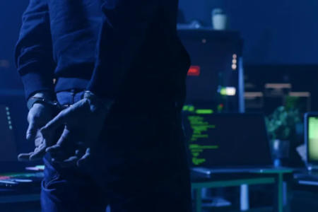 Hacker in Handcuffs