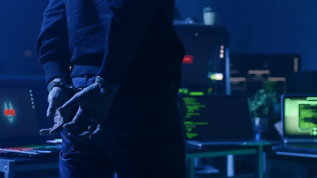 Hacker in Handcuffs