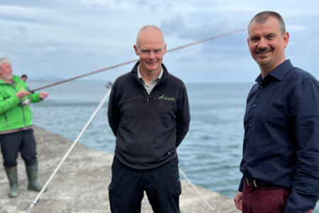 Angler Brian Cooke with William Roche, Inland Fisheries Ireland, and Schalk Van Lill, Esri Ireland