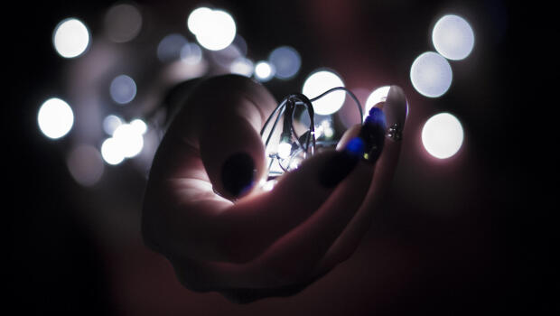 Lights being held