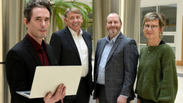 Pictured: Brian Marshall and Sean Abbott, Cope Foundation; Colin Chapman, Datapac; and Marguerite O’Brien, Head of Shared Services, Cope Foundation