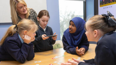 Pictured: Karen Nolan, Lecturer in Computing at TU Dublin with pupils from Stanhope St School, Rose Brockie, Riley Rice, Jamila Ahmed and Beau Graham
