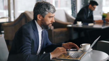Businessman using email