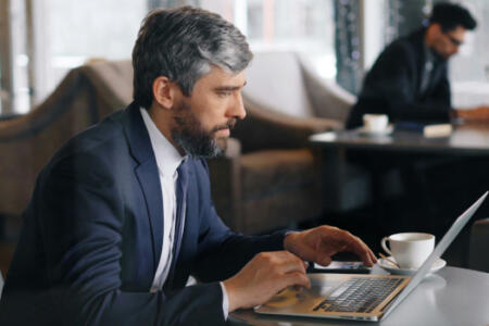 Businessman using email