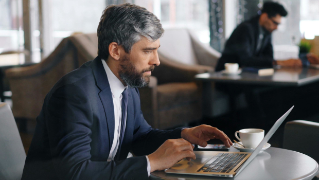 Businessman using email