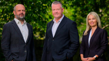 Pictured: Ken Sheehan, Tim Crowe, and Jennifer Kelly, Wrxflo