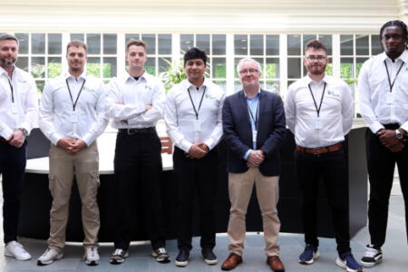 Pictured: Michael McCarthy, Stephen Long, Joe Long, Sanjeev Maharjan, Simon Cosgrove, Killian Brady, and George Ebene, Olive for Education